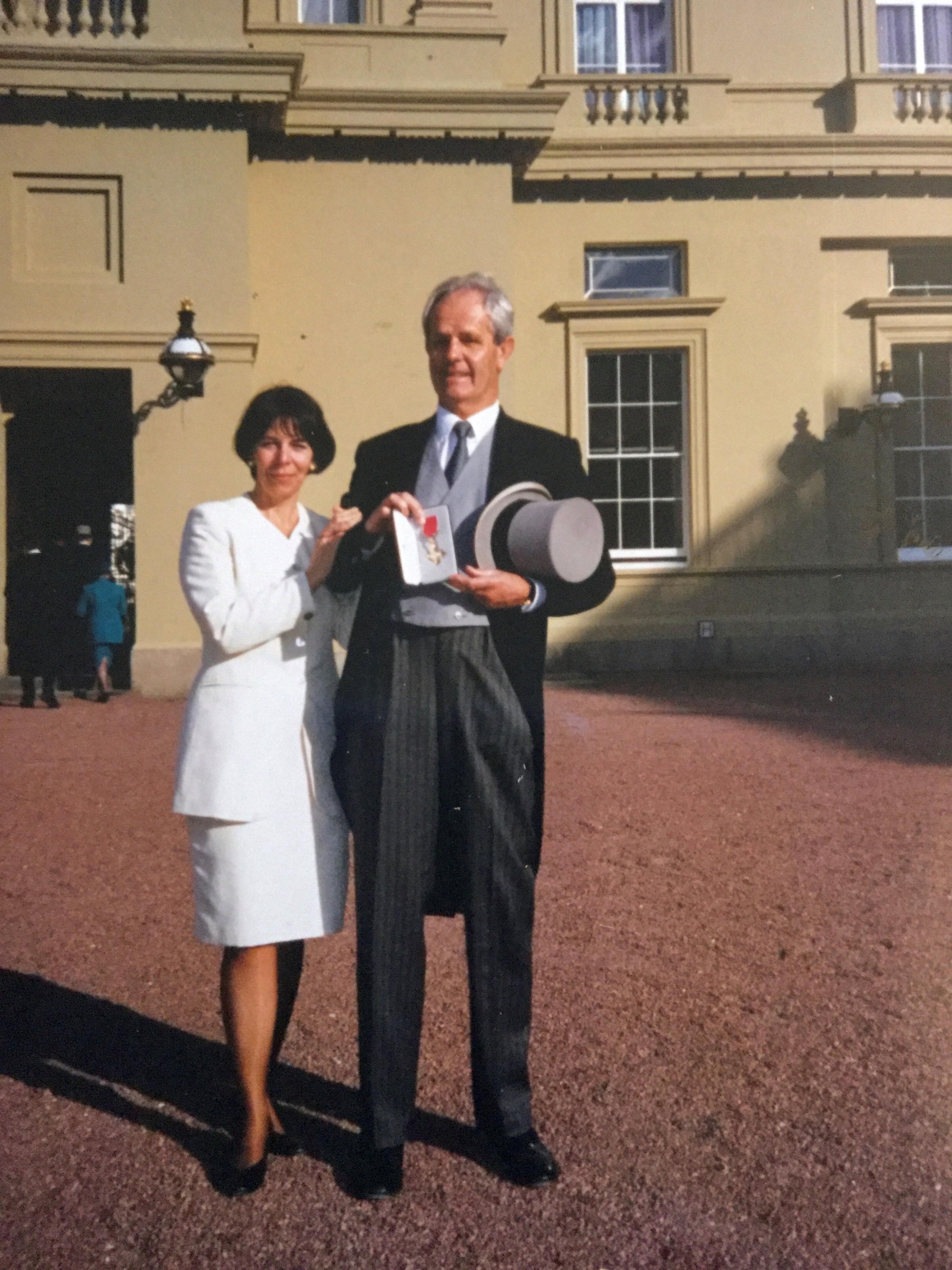 CONSERVATION: Laurence and Melissa Harwood at Buckingham Palace after Mr Harwood received an OBE for his conservation works