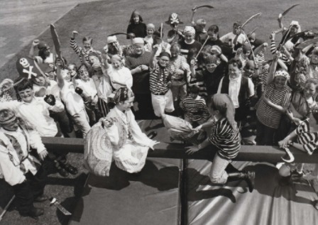 BATTLE: On the plank during a pirates party in 1993 are battling mateys Hannah Caton and Katherine Pickering, cheered on by cutlass-waving crew