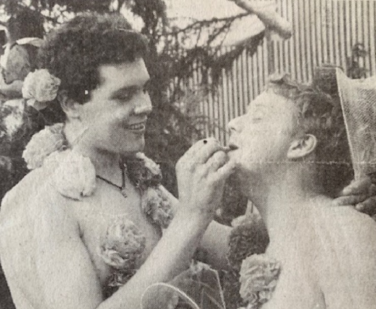 DRESS UP: Philip Walker and Simon Pollitt from Wray Castle put the final touches to their make-up as hula hula girls in the festival parade